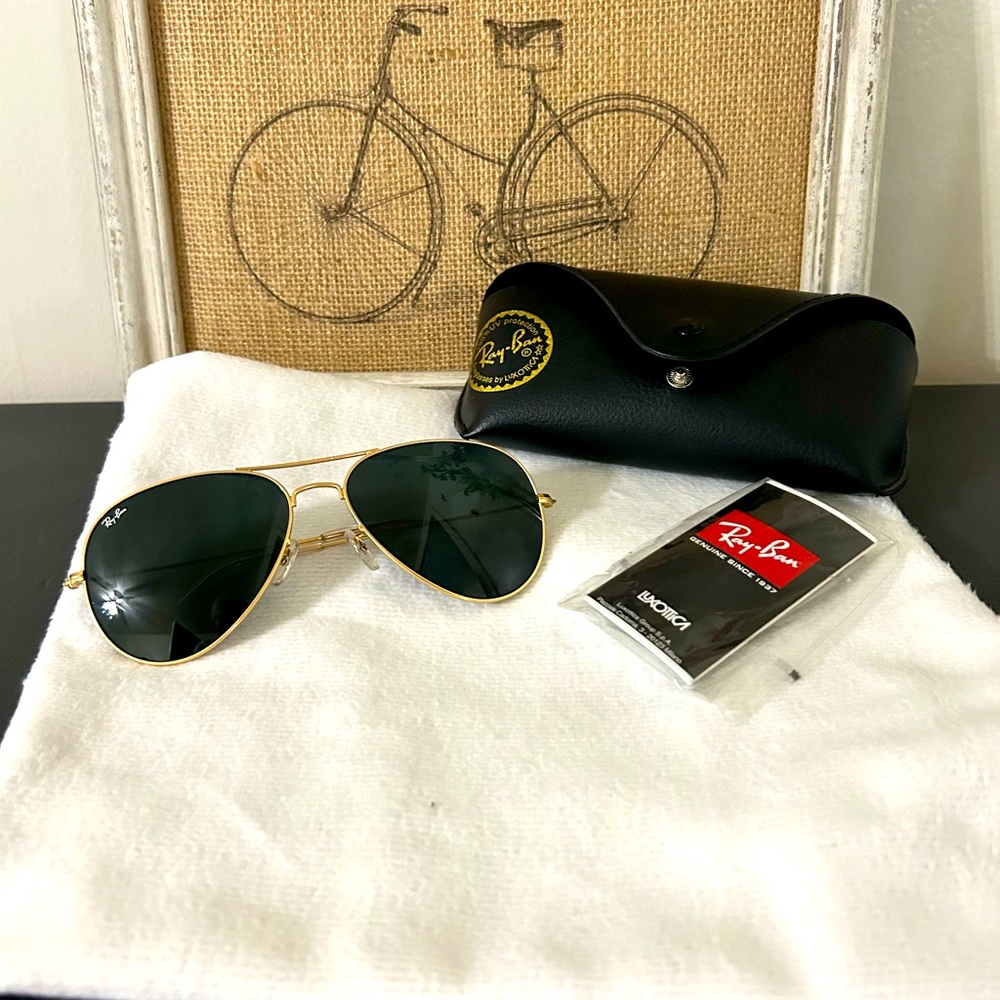 Ray Ban  Aviator Sun glasses.  Only used a few times.
